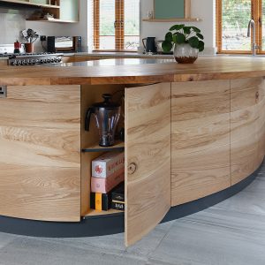 Fresh, contemporary farmhouse kitchen with curved island, made from local Cumbrian Ash hardwood by HOUT