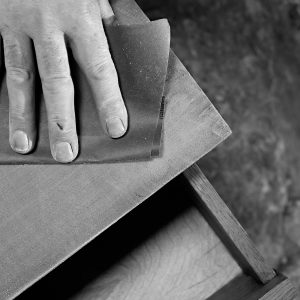 Attention to detail, sanding our furniture by hand at HOUT